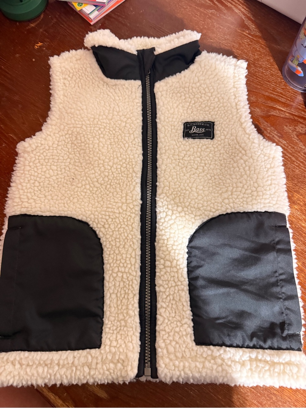 Bass Cream Sherpa Vest with Black Trim and Maroon Accent